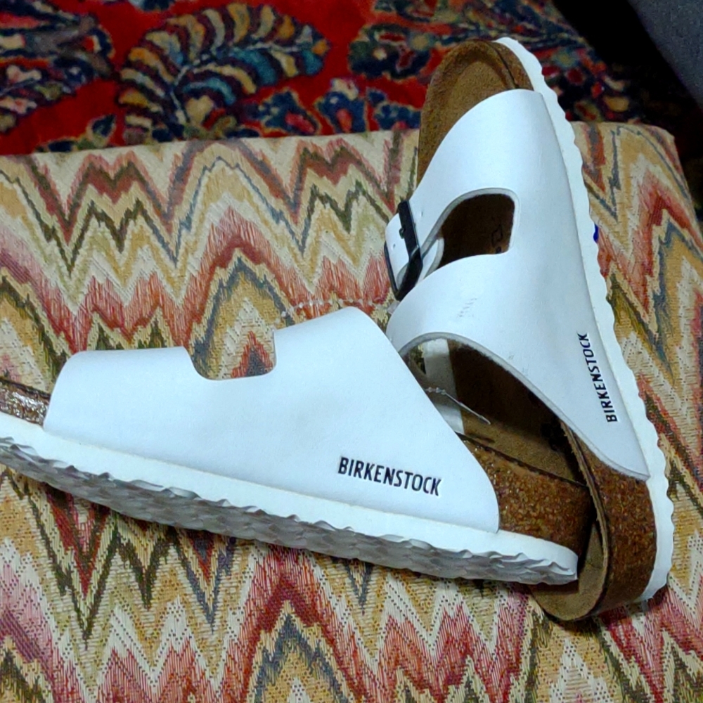 1 pair of children's Birkenstocks. White.